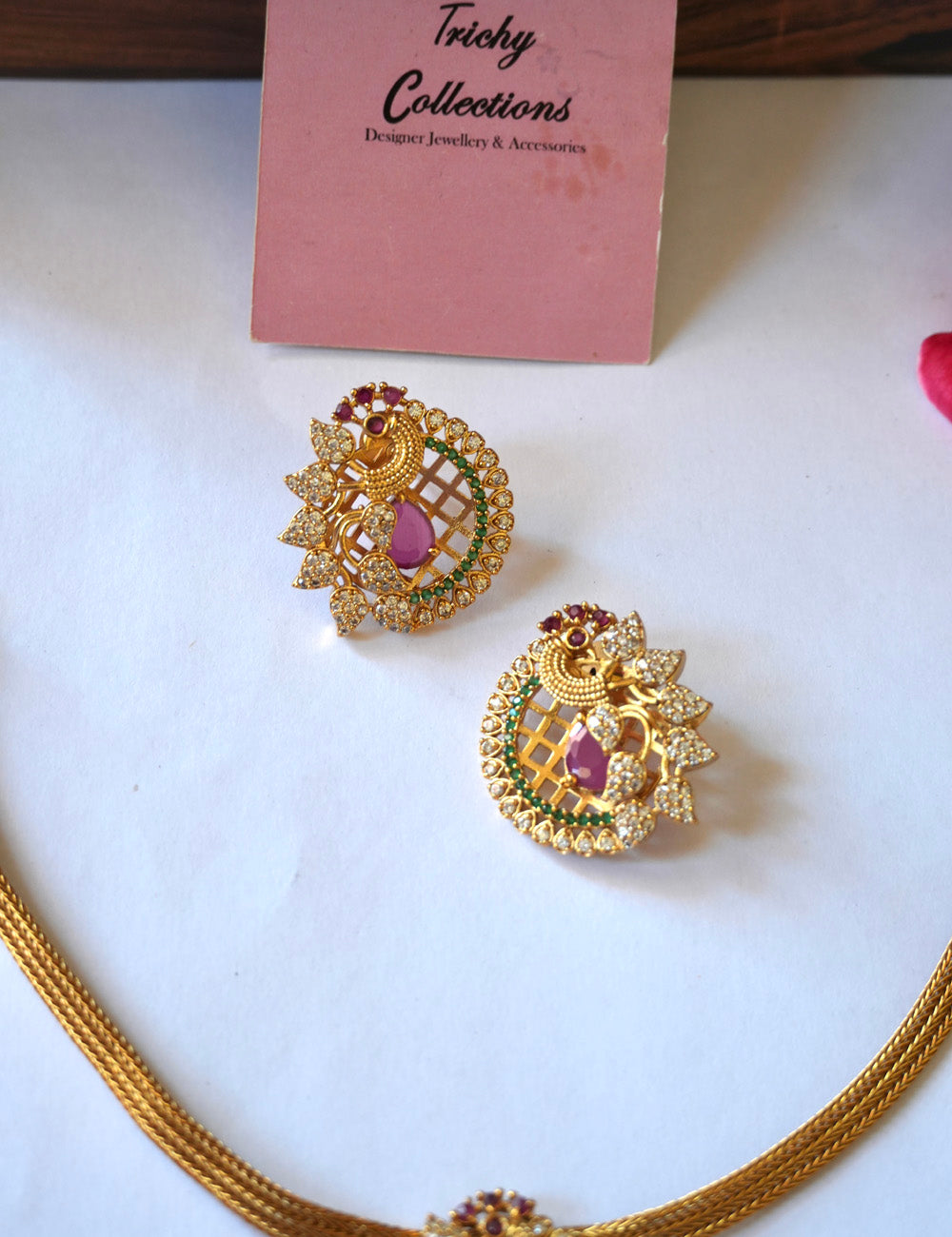 Peacock ad stone attigai 